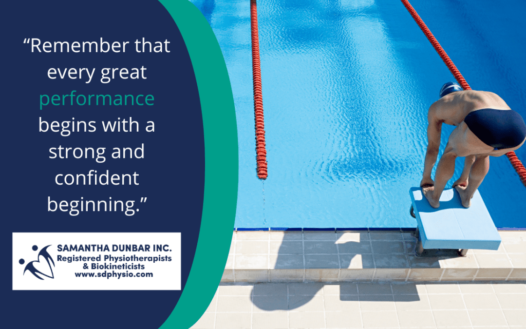 Swimmer on starting block, above to dive into pool.