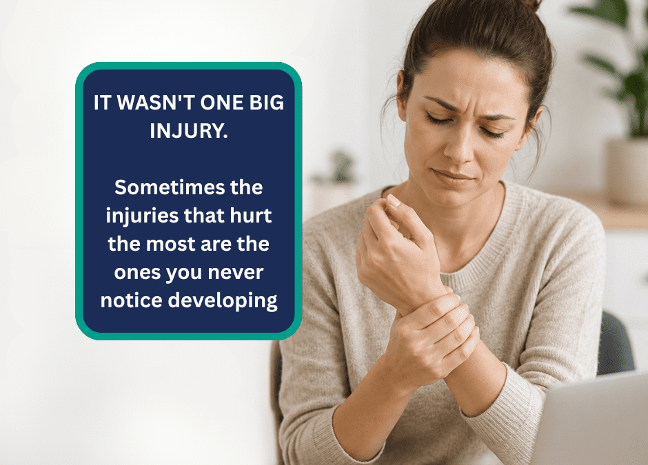 A woman holding her sore wrist - RSI